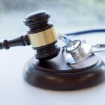 stethoscope and law gavel