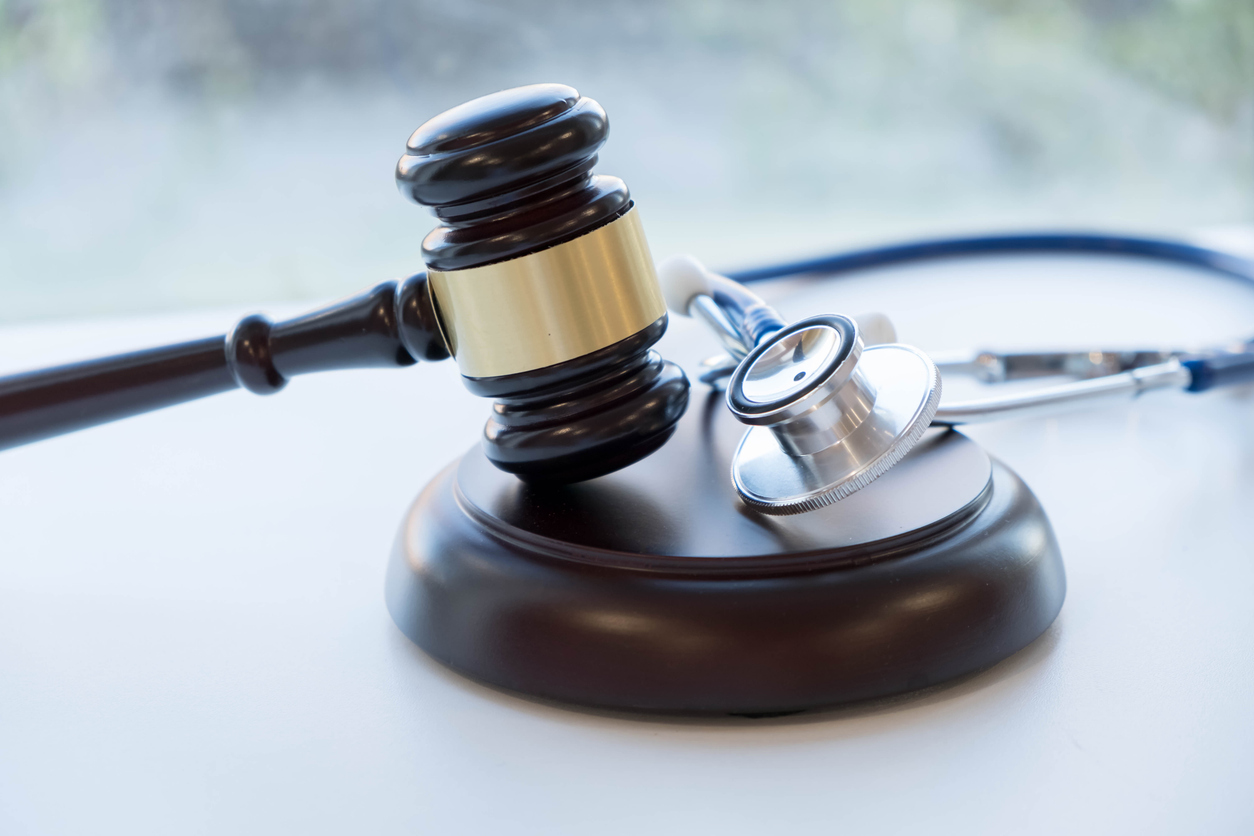 stethoscope and law gavel