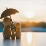 Umbrella icon and family model, Security protection and health insurance. The concept of family home, protection, health care day, car insurance.